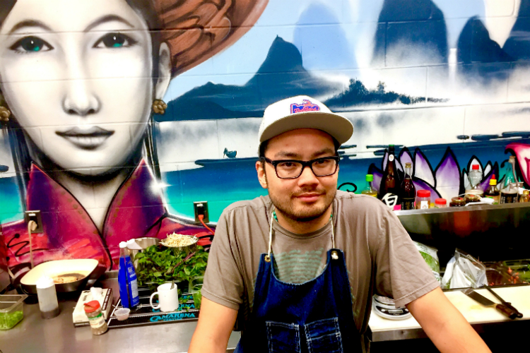 Tony Vu—chef, entrepreneur, musician, Flint booster—stands at the MaMang counter.