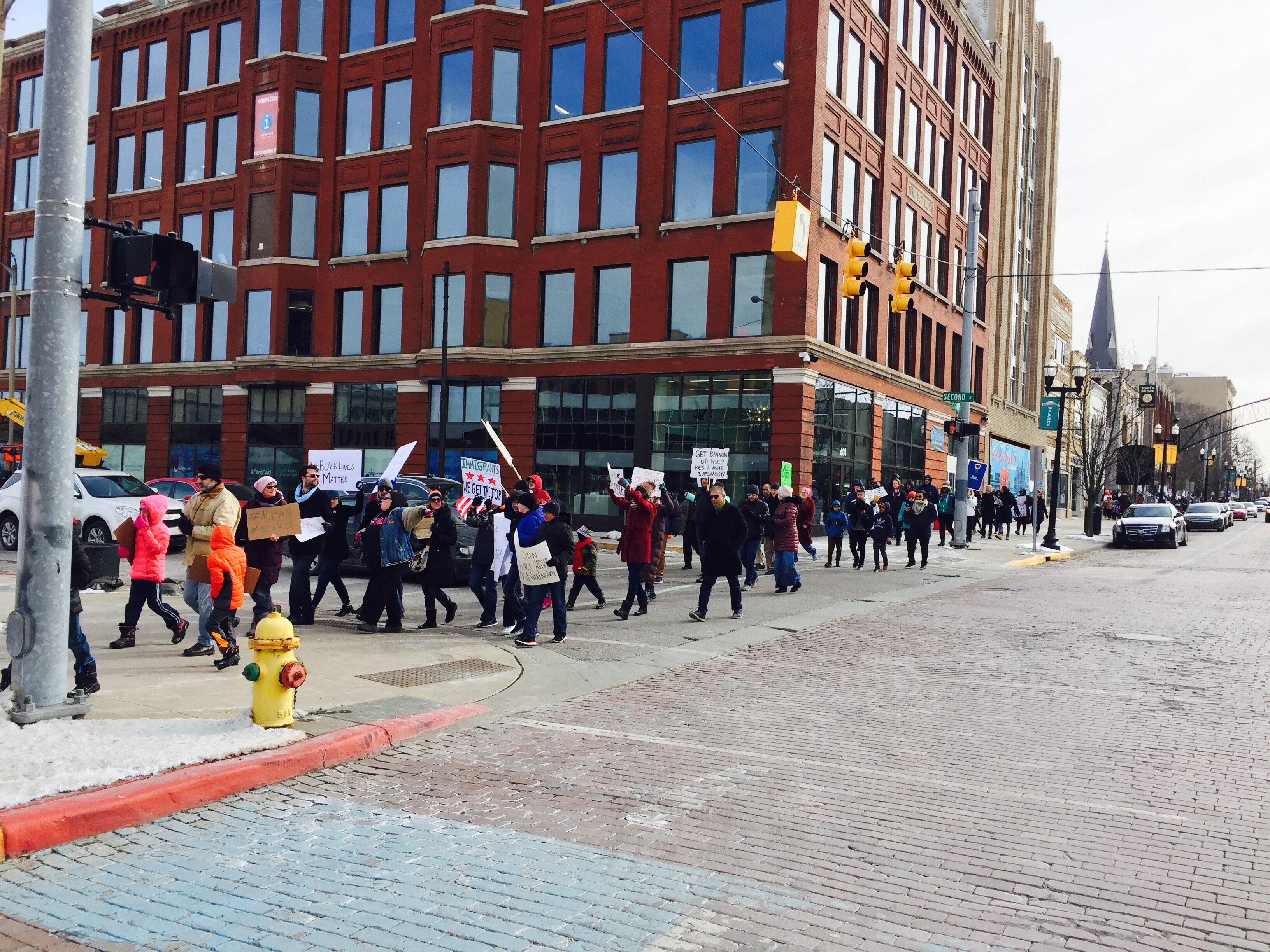 Marchers walked from City Hall to UM-Flint in support of Muslim residents in the community.