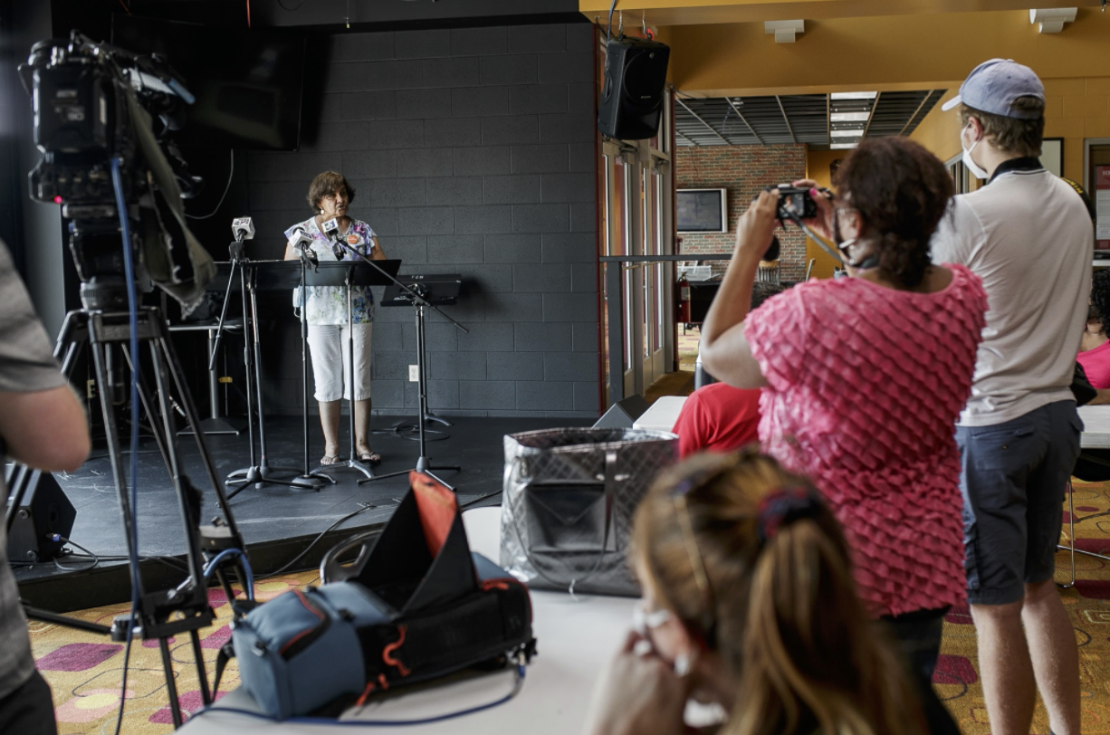 Aurora Sauceda, a community leader in Flint, spoke during the press conference in support of the Genesee County Health Department K-6 mask mandate.