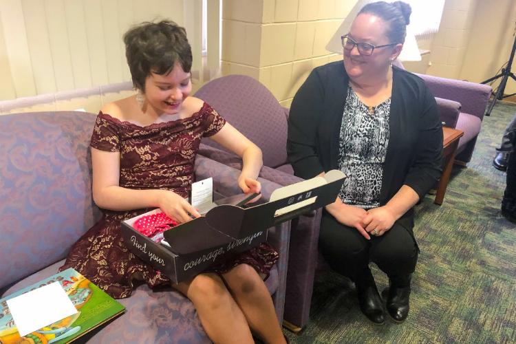 Lauren Stansburry receives the first McKenna's Beauty Bar Box at Hurley Hospital.