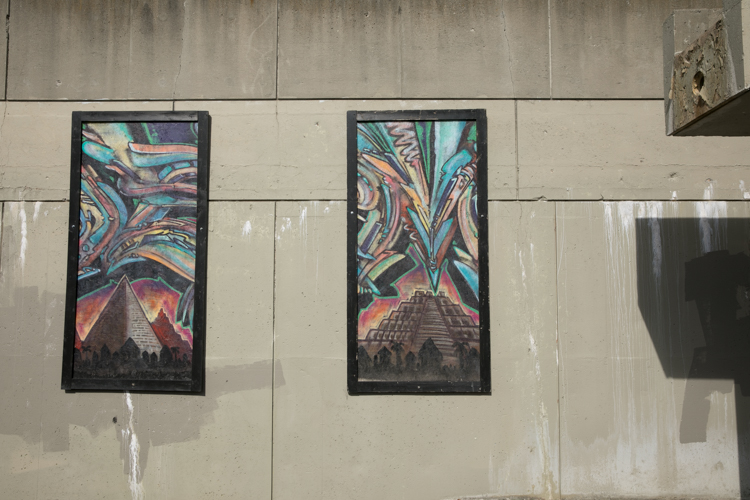 Murals line the Riverwalk in downtown Flint.