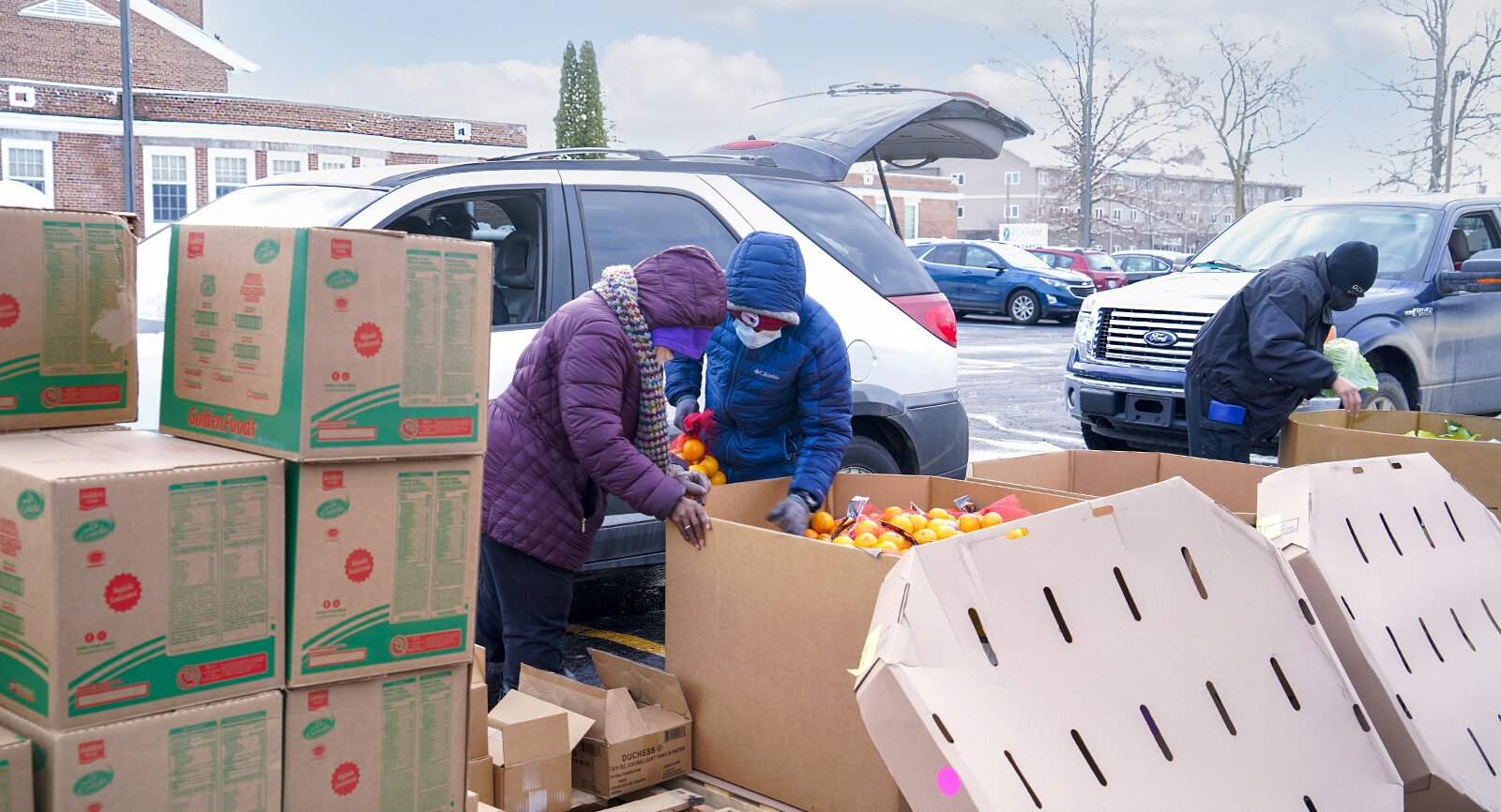 Staff and volunteers at Bethel United Methodist Church distribute food and other resources to Flint residents. 