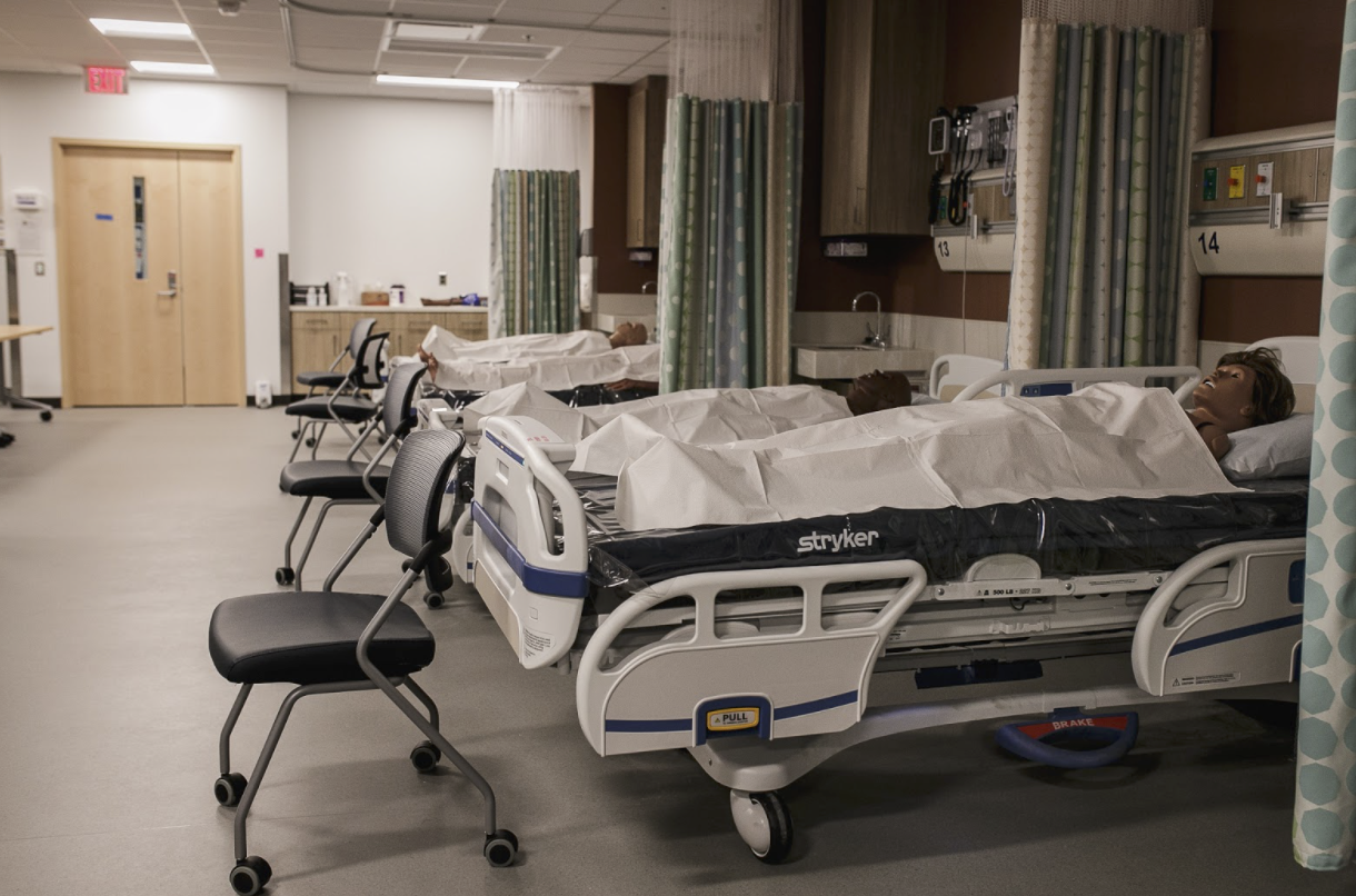The University of Michigan-Flint nursing simulation lab with low-fidelity mannequins used for students to practice assessments and situational exams.