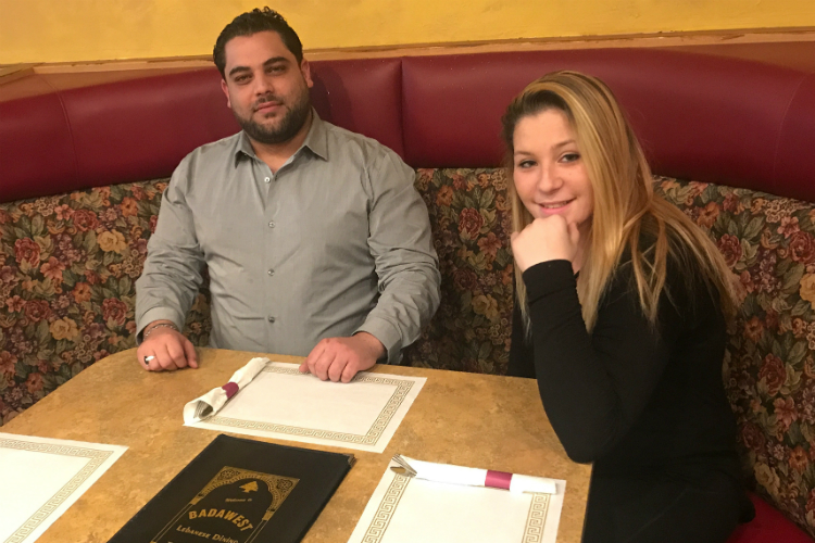 New co-owner Ali Shamass of Badawest on Corunna Road sits with veteran waitress Katelin Miller.