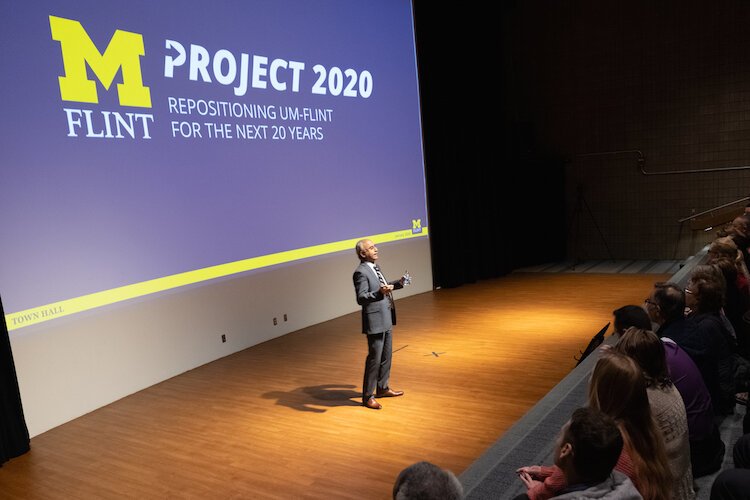 Chancellor Debasish Dutta presents UM-Flint’s Project 2020 action plan to a crowd.