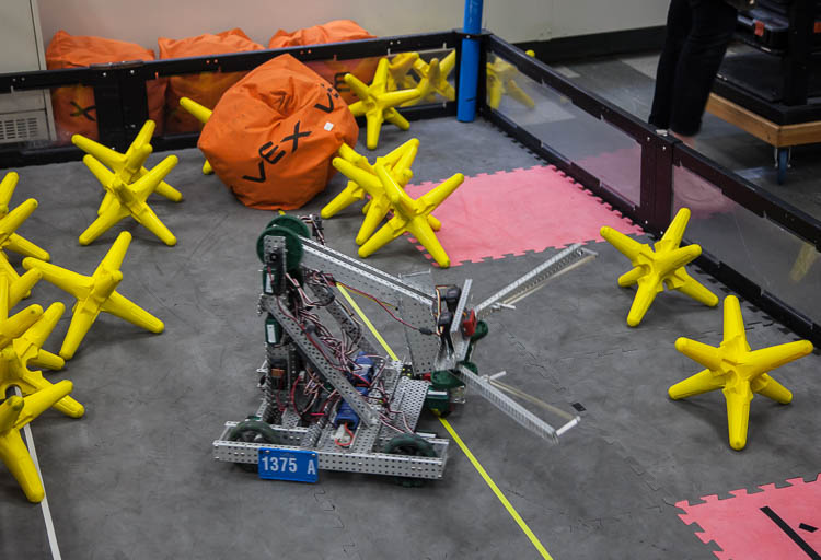 A robot runs through the paces under the control of student drivers.