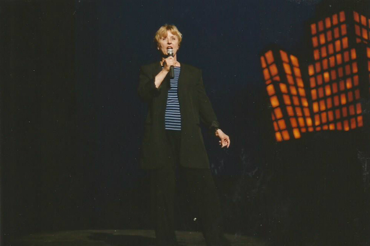 Sandra Brewer addresses the crowd before a recital. 