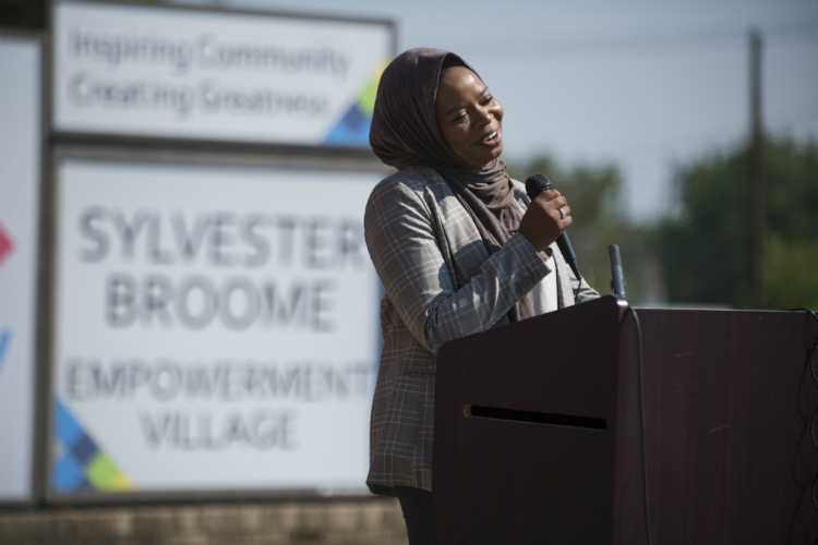 Sylvester Broome Empowerment Village Executive Director Maryum Rasool gives a speech at the Sylvester Broome Empowerment Village Friday, June 29, 2018 in Flint. 