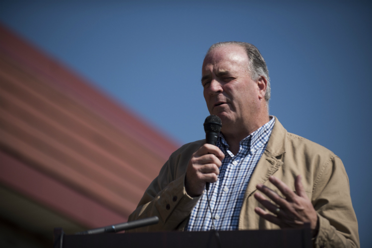 U.S. Rep. Dan Kildee, D-Flint, helps celebrate the opening of the Sylvester Broome Empowerment Village.