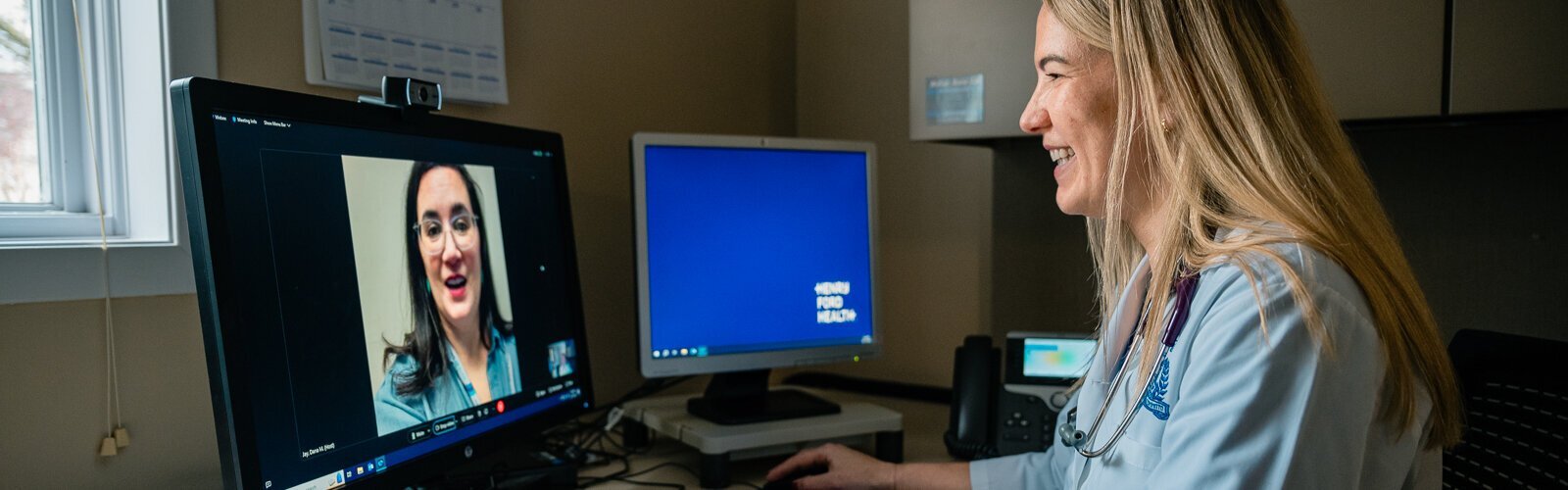 Dr. Jennifer Burgess, seen here using a telehealth platform, is one of several Henry Ford Health practitioners working to improve the telehealth experience for patients.