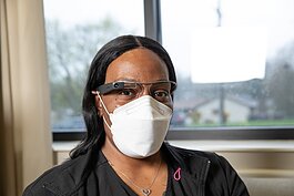 Dee Meux, a certified nursing assistant at Samaritas, wears Glass smart glasses.