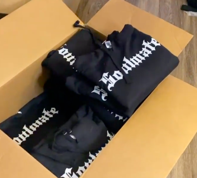 A fresh shipment of Soulmate hooded sweatshirts awaits packaging and shipping.