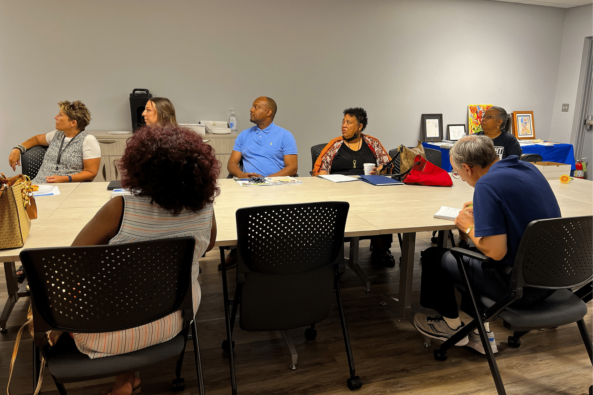 2nd Ward residents taking in information about resources and new developments across Flint. 