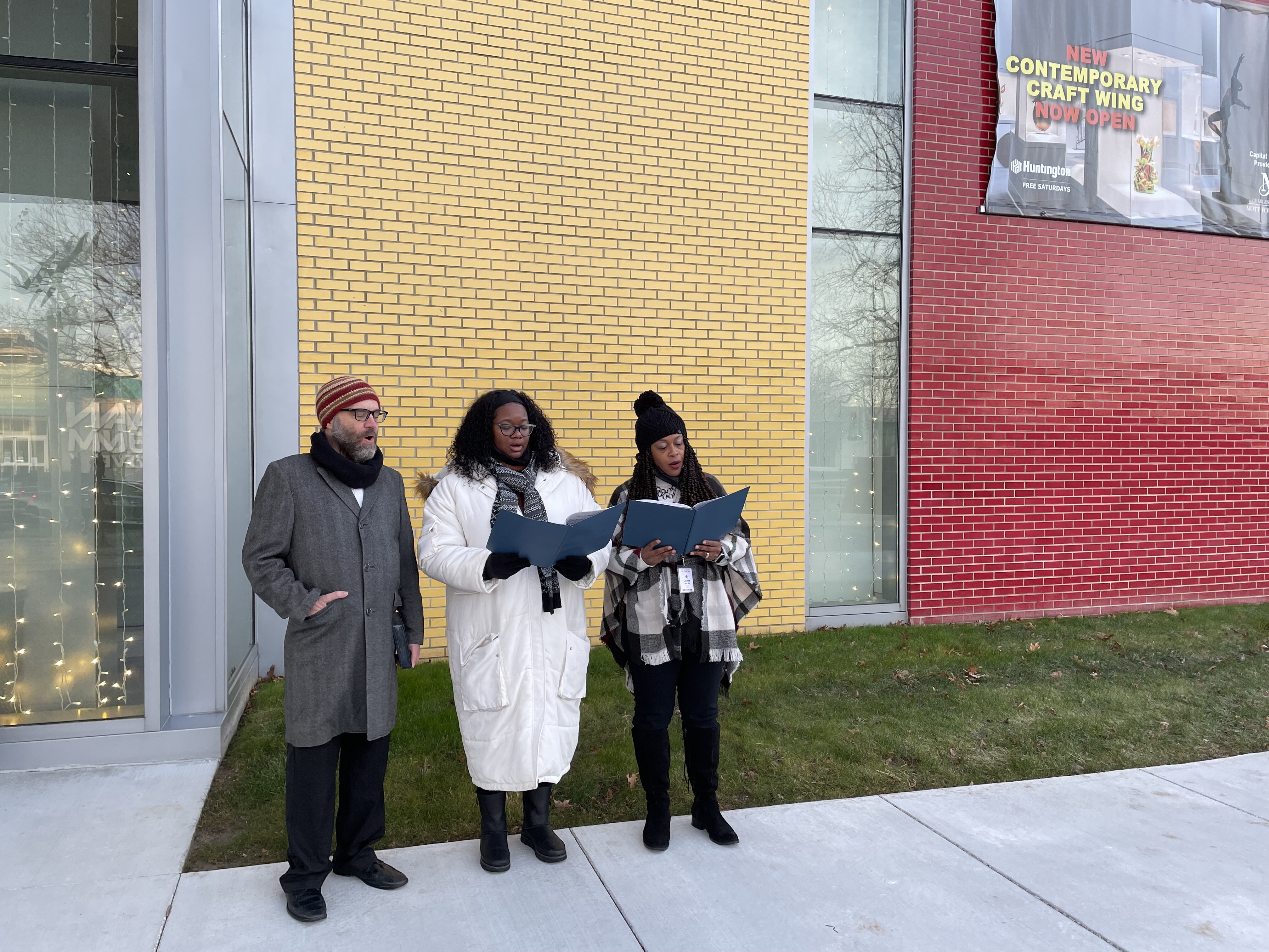 Three chorale singers from the Flint Institute of Music were in attendance to sing Christmas carols. 