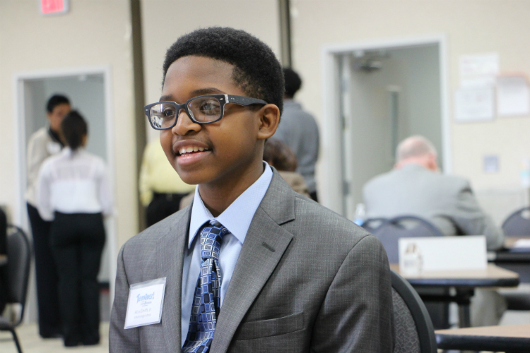 A TeenQuest student participates in a mock interview as part of the job preparedness program operated by the Flint & Genesee Chamber of Commerce.