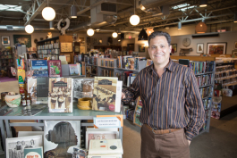 Flint attorney Dean Yeotis opened Totem Books about a year and a half ago into a vacant former liquor store—tranforming it into a new home for weathered arts and symbol of neighborhood investment.  