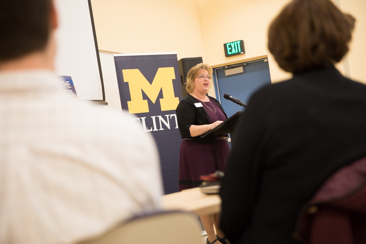 Susan Gano-Phillips, dean of the College of Arts and Sciences at UM-Flint, speaks at ribbon cutting.