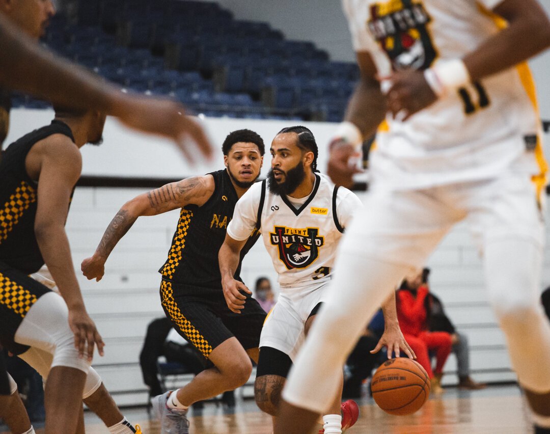 Roger Hood II drives inside during Flint United's home opener on April 16.