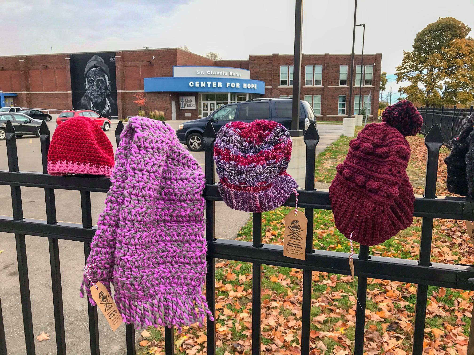 Flint Handmade volunteers made and donated more than 500 hats, scarves, and gloves at locations around the city in December.