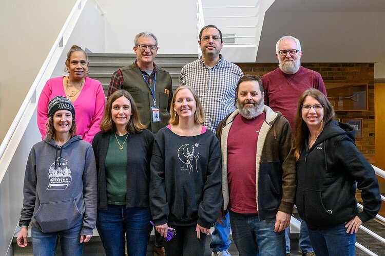 Washtenaw County CMH staff. Top row L-R: Valerie Bass, Dr. Montgomery Brower, Andrew Grier, Shad Jordan. Bottom row l-R: Shannon Ellis, Margaret Carmalt, Angela Burchard, Jeff Beckley, Melisa Tasker.