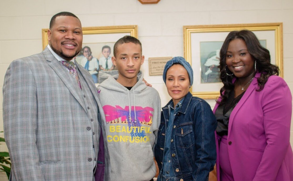 Pastor Ezra Tillman Jr. and Catrina Tillman with Jayden Smith and Jada Pinkett-Smith.