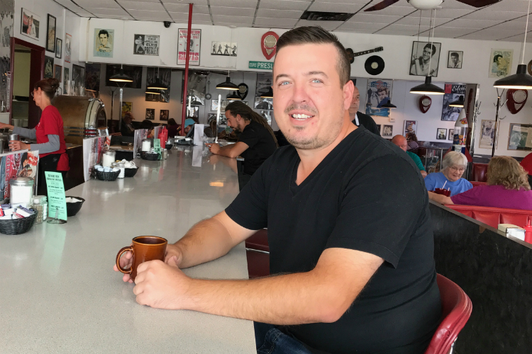 Frank Dinaj, co-owner of Westside Diner since 2002, can be found behind the grill daily. 